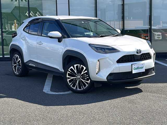 トヨタ ヤリスクロス ハイブリッド 岐阜県 2021(令3)年 4.7万km ホワイトパールクリスタルシャイン 登録時走行距離47090km/純正ディスプレイオーディオ/バックカメラ/クルーズコントロール/ステアリングヒーター/禁煙車/シートヒーター/ハーフレザーシート/ビルトインＥＴＣ/レーンキープアシスト/前後コーナーセンサー/プッシュスタート/スマートキー/スペアキー/電動リアゲート/LEDヘッドライト/オートライト/フォグランプ/オートマチックハイビーム/ドアバイザー/Bluetooth接続/USB入力端子/アイドリングストップ