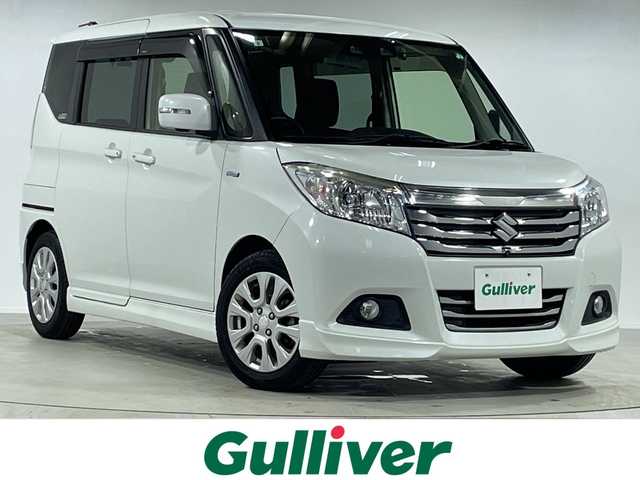 スズキ ソリオ HV MZ 神奈川県 2019(令1)年 3.7万km ピュアホワイトP ワンオーナー/純正8インチSDナビ/AM/FM/Bluetooth接続/USB/CD/DVD/iPod/フルセグTV/全周囲カメラ/両側パワースライドドア/シートヒーター/アダプティブクルーズコントロール/前後ドライブレコーダー/純正フロアマット/スマートキー/アイドリングストップ/コーナーセンサー/オートマチックハイビーム/横滑り防止装置/盗難防止装置/衝突被害軽減システム