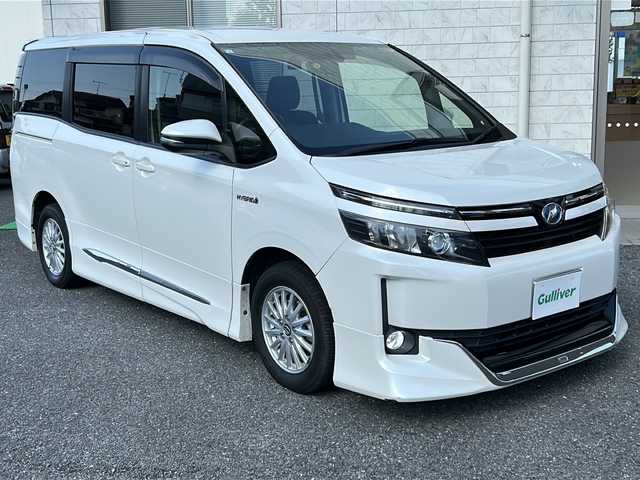 トヨタ ヴォクシー ハイブリッド V 埼玉県 2015(平27)年 11.9万km ホワイトパールクリスタルシャイン 純正ナビ　　DVD/BT/SD/USB/CD/ETC　/ドラレコ　/両側電動ドア　/シートヒーター　/フルセグ　/TRC/オートライト/電格ミラー/クルコン/バックカメラ　/Pスタート