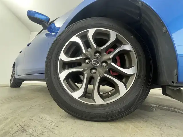 マツダ デミオ XD ツーリング 岡山県 2015(平27)年 9.4万km ダイナミックブルーマイカ クルーズコントロール/純正7インチナビ/（ＣＤ/ＤＶＤ/ＢＴ/フルセグＴＶ）/衝突軽減ブレーキ/ビルトインＥＴＣ/ＬＥＤヘッドライト/バックカメラ/オートハイビーム/オートライト/フォグランプ/プッシュスタート/パドルシフト/純正フロアマット/ＵＳＢ接続/アイドリングストップ/取扱説明書