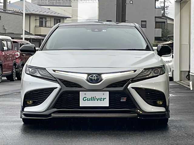トヨタ カムリ WS 岐阜県 2022(令4)年 3.1万km アティチュードブラックマイカ/プラチナホワイトパールマイカ 禁煙車/純正ディスプレイオーディオ/AM/FM/USB/BT/Mira cast/トヨタセーフティセンス/クリアランスソナー/バックカメラ/プリクラッシュセーフティ/レーンキープアシスト/ブラインドスポットモニター/オートライト/オートハイビーム/LEDヘッドライト/レーダークルーズコントロール/ハーフレザーシート/シートヒーター/パワーシート/パワーバックドア/電動チルトステアリング/ドライブレコーダー/電動チルトステアリング/スマートキー/ドライブレコーダー/ブラック＆パールツートンカラー/フルエアロ/WORK19インチアルミホイール/BLITZ車高調/BLITZ4本出しマフラー/イルミスカッフプレート/純正サスペンション・1部純正パーツ積込