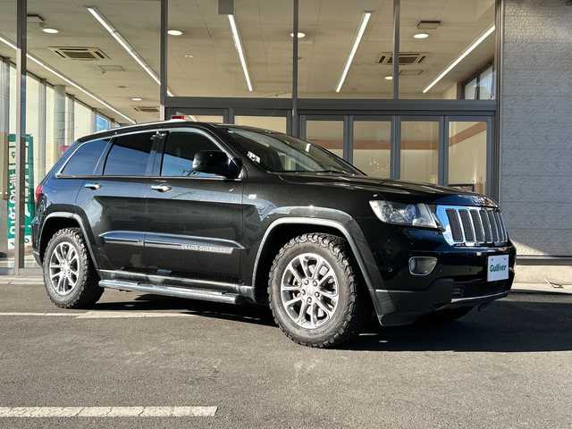 クライスラー・ジープ ジープ グランドチェロキー LTD 埼玉県 2013(平25)年 12.2万km ブリリアントブラッククリスタル リミテッドグレード/4WD/ブラックレザー/社外ナビ/フルセグ/寒冷地仕様/クルーズコントロール/Bluetooth/オートエアコン/全席シートヒーター/ステアリングヒーター/シートメモリー/盗難防止装置/純正18インチアルミホイール/ダウンヒルアシストコントロール/ルーフレール有/純正フロアマット/ETC