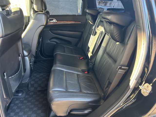 クライスラー・ジープ ジープ グランドチェロキー LTD 埼玉県 2013(平25)年 12.2万km ブリリアントブラッククリスタル リミテッドグレード/4WD/ブラックレザー/社外ナビ/フルセグ/寒冷地仕様/クルーズコントロール/Bluetooth/オートエアコン/全席シートヒーター/ステアリングヒーター/シートメモリー/盗難防止装置/純正18インチアルミホイール/ダウンヒルアシストコントロール/ルーフレール有/純正フロアマット/ETC