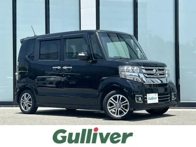 ホンダ Ｎ ＢＯＸ カスタム G SSパッケージ 大阪府 2017(平29)年 6.6万km クリスタルブラックパール 純正ナビ/   フルセグTV/CD/DVD/Bluetooth/バックモニター/横滑り防止装置/前席シートヒーター/両側パワースライドドア/アイドリングストップ/前後ドライブレコーダー/純正14インチアルミホイール/純正フロアマット/プッシュスタート/スマートキー/ＥＴＣ/禁煙車