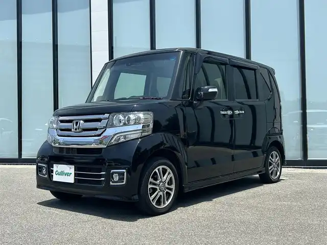 ホンダ Ｎ ＢＯＸ カスタム G SSパッケージ 大阪府 2017(平29)年 6.6万km クリスタルブラックパール 純正ナビ/   フルセグTV/CD/DVD/Bluetooth/バックモニター/横滑り防止装置/前席シートヒーター/両側パワースライドドア/アイドリングストップ/前後ドライブレコーダー/純正14インチアルミホイール/純正フロアマット/プッシュスタート/スマートキー/ＥＴＣ/禁煙車