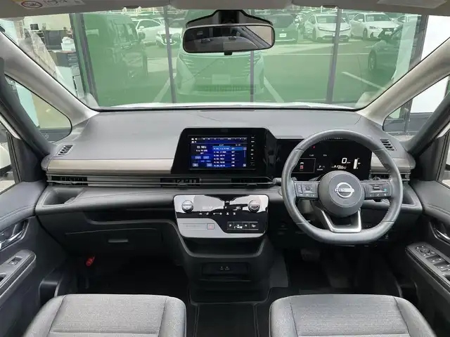 日産 セレナ ハイウェイスター V 香川県 2024(令6)年 1.1万km プリズムホワイト プロパイロット/クルーズコントロール/ブラインドスポットモニター/オートホールド/両側パワースライドドア/バックカメラ/純正ナビ/純正フロアマット/純正アルミホイール16インチ/Bluetooth/ETC/パワーウィンドウ/オートエアコン/プッシュスタート/スマートキー