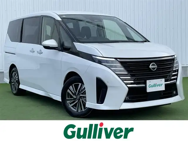 日産 セレナ ハイウェイスター V 香川県 2024(令6)年 1.1万km プリズムホワイト プロパイロット/クルーズコントロール/ブラインドスポットモニター/オートホールド/両側パワースライドドア/バックカメラ/純正ナビ/純正フロアマット/純正アルミホイール16インチ/Bluetooth/ETC/パワーウィンドウ/オートエアコン/プッシュスタート/スマートキー