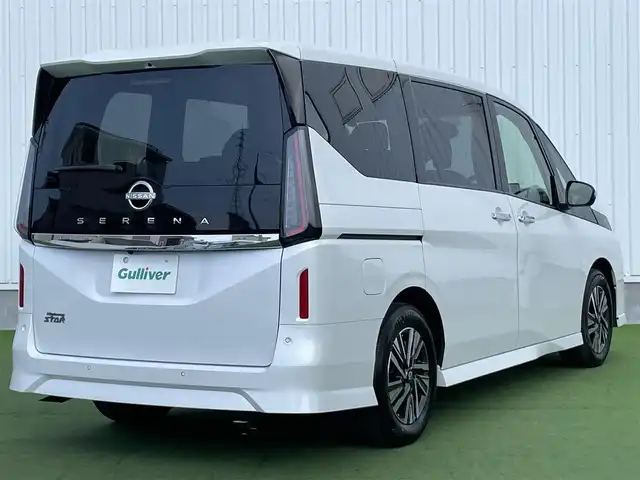 日産 セレナ ハイウェイスター V 香川県 2024(令6)年 1.1万km プリズムホワイト プロパイロット/クルーズコントロール/ブラインドスポットモニター/オートホールド/両側パワースライドドア/バックカメラ/純正ナビ/純正フロアマット/純正アルミホイール16インチ/Bluetooth/ETC/パワーウィンドウ/オートエアコン/プッシュスタート/スマートキー