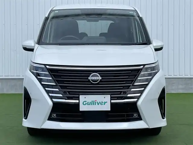 日産 セレナ ハイウェイスター V 香川県 2024(令6)年 1.1万km プリズムホワイト プロパイロット/クルーズコントロール/ブラインドスポットモニター/オートホールド/両側パワースライドドア/バックカメラ/純正ナビ/純正フロアマット/純正アルミホイール16インチ/Bluetooth/ETC/パワーウィンドウ/オートエアコン/プッシュスタート/スマートキー