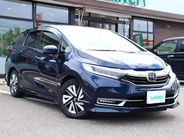 ホンダ シャトル G ホンダセンシング 福島県 2021(令3)年 4.9万km ミッドナイトブルービームM  ワンオーナー / ホンダセンシング/ 純正SDナビ＋フルセグTV/ バックカメラ/ クルーズコントロール/ アイドリングストップ/ 純正フォグランプ/ レーンアシスト/ プッシュスタート/ 横滑り防止/ フロントリアコーナーセンサー/ 純正前後ドライブレコーダー/ 純正ラバーマット/ 新車保証書/ 取扱説明書