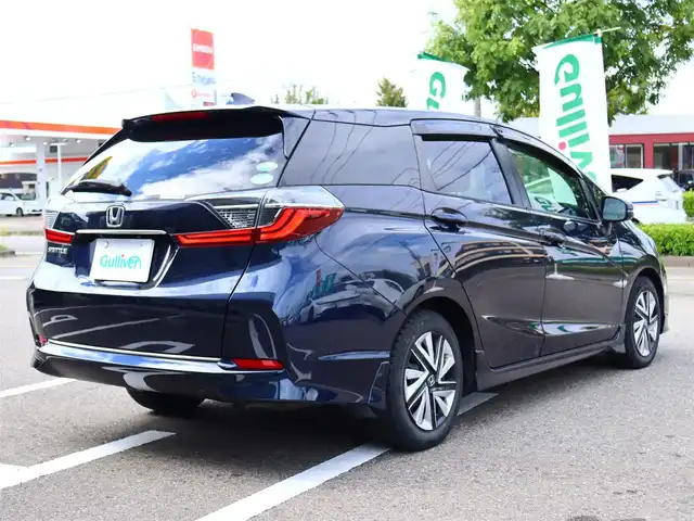 ホンダ シャトル G ホンダセンシング 福島県 2021(令3)年 4.9万km ミッドナイトブルービームM  ワンオーナー / ホンダセンシング/ 純正SDナビ＋フルセグTV/ バックカメラ/ クルーズコントロール/ アイドリングストップ/ 純正フォグランプ/ レーンアシスト/ プッシュスタート/ 横滑り防止/ フロントリアコーナーセンサー/ 純正前後ドライブレコーダー/ 純正ラバーマット/ 新車保証書/ 取扱説明書