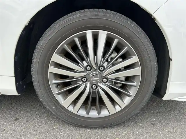 ホンダ オデッセイ ハイブリッド アブソルート・EXホンダセンジング 静岡県 2019(平31)年 3.1万km パール ホンダセンシング/・VSA（ABS＋TCS＋横すべり抑制）/純正7インチナビ/（CD/DVD/Bluetooth/FM/AM/SD）/マルチビューモニター/ETC2.0/カーテンエアバッグ/後席モニター/オートライト/オットマン/キャプテンシート/Wオートエアコン/デュアルエアコン/純正17AW