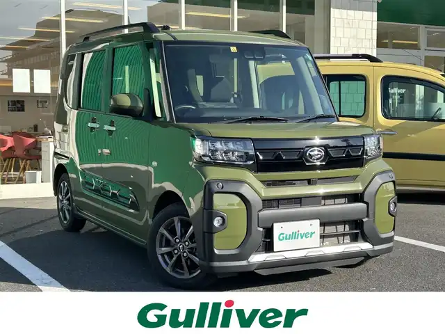 ダイハツ タント ファンクロス 島根県 2022(令4)年 1.3万km フォレストカーキメタリック 社外ＳＤナビ　/フルセグTV　/ＤＶＤ再生　/Ｂｌｕｅｔｏｏｔｈ接続　/両側パワースライドドア　/アイドリングストップ　/衝突軽減ブレーキ　/レーンキープアシスト/前後コーナーセンサー　/前席シートヒーター　/オートハイビーム／ライト　/スマートキー/プッシュスタート/純正LEDヘッドライト　/純正１４インチアルミホイール/保証書・取扱説明書