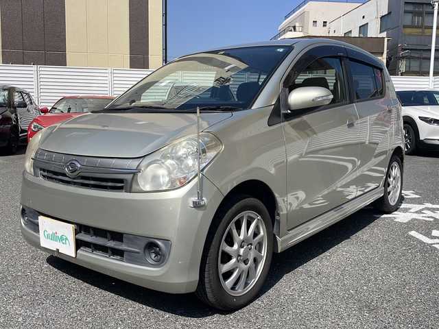 ダイハツ ミラ カスタム RS 広島県 2010(平22)年 10.1万km シャンパンゴールドメタリック /登録時走行距離/　　　　　　　100146キロ/ワンオーナー/純正ナビ/スペアキー×１/新車時整備手帳/　　【保証書】/取扱説明書/
