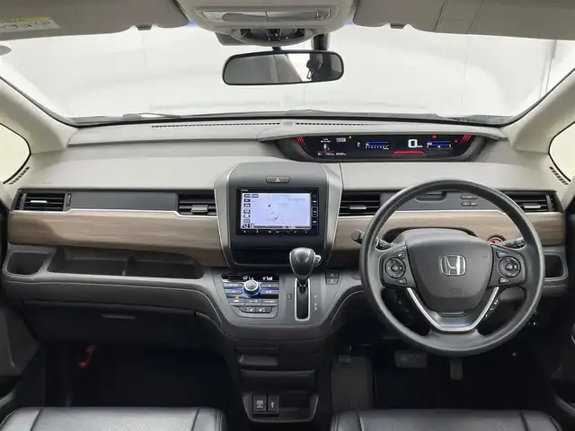 ホンダ フリード G ホンダセンシング 茨城県 2020(令2)年 1.6万km クリスタルブラックパール 純正ナビ/バックカメラ/フルセグ/衝突被害軽減ブレーキ/車線逸脱抑制装置/レーダークルーズコントロール/両側電動スライドドア/ETC/ドラレコ/社外シートカバー/シートヒーター/LEDヘッドライト/スマートキー