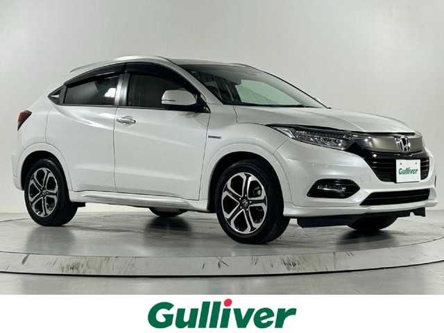 ホンダ ヴェゼル ハイブリッド Z ホンダセンシング 佐賀県 2020(令2)年 5.9万km プラチナホワイトパール 純正8インチナビ/フルセグTV/Bluetooth/CD/DVD/HDMI/ホンダセンシング/クルーズコントロール/バックカメラ/ドライブレコーダー/ビルトインETC/ステアリングスイッチ/パドルシフト/ハーフレザーシート/前席シートヒーター/純正17インチAW/LEDヘッドライト/オートライト/フォグランプ/革巻きステアリング/電動パーキングスイッチ