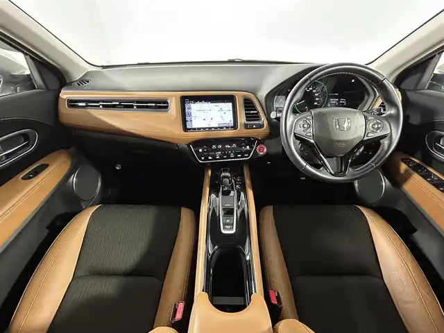 ホンダ ヴェゼル ハイブリッド Z ホンダセンシング 佐賀県 2020(令2)年 5.9万km プラチナホワイトパール 純正8インチナビ/フルセグTV/Bluetooth/CD/DVD/HDMI/ホンダセンシング/クルーズコントロール/バックカメラ/ドライブレコーダー/ビルトインETC/ステアリングスイッチ/パドルシフト/ハーフレザーシート/前席シートヒーター/純正17インチAW/LEDヘッドライト/オートライト/フォグランプ/革巻きステアリング/電動パーキングスイッチ