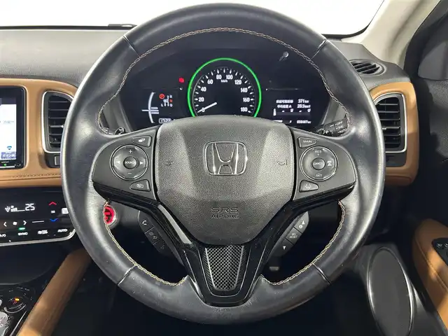 ホンダ ヴェゼル ハイブリッド Z ホンダセンシング 佐賀県 2020(令2)年 5.9万km プラチナホワイトパール 純正8インチナビ/フルセグTV/Bluetooth/CD/DVD/HDMI/ホンダセンシング/クルーズコントロール/バックカメラ/ドライブレコーダー/ビルトインETC/ステアリングスイッチ/パドルシフト/ハーフレザーシート/前席シートヒーター/純正17インチAW/LEDヘッドライト/オートライト/フォグランプ/革巻きステアリング/電動パーキングスイッチ