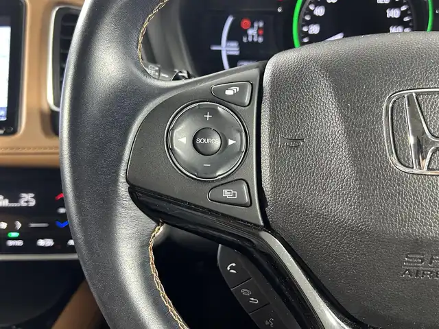 ホンダ ヴェゼル ハイブリッド Z ホンダセンシング 佐賀県 2020(令2)年 5.9万km プラチナホワイトパール 純正8インチナビ/フルセグTV/Bluetooth/CD/DVD/HDMI/ホンダセンシング/クルーズコントロール/バックカメラ/ドライブレコーダー/ビルトインETC/ステアリングスイッチ/パドルシフト/ハーフレザーシート/前席シートヒーター/純正17インチAW/LEDヘッドライト/オートライト/フォグランプ/革巻きステアリング/電動パーキングスイッチ