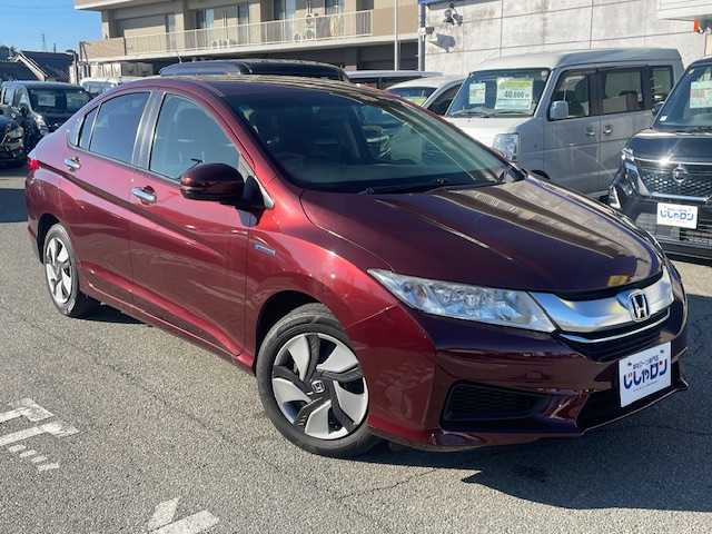 ホンダ グレイス ハイブリッド LX 兵庫県 2015(平27)年 7.3万km プレミアムディープロッソパール 登録時走行距離72436km/純正SDナビ/(AM/FM/DISC/TV/BT)/バックカメラ/クルーズコントロール/ETC/プッシュスタート/スマートキー/スペアキー/パワーウィンドウ/パワーステアリング/保証書/取扱説明書/記録簿/キセノンライト