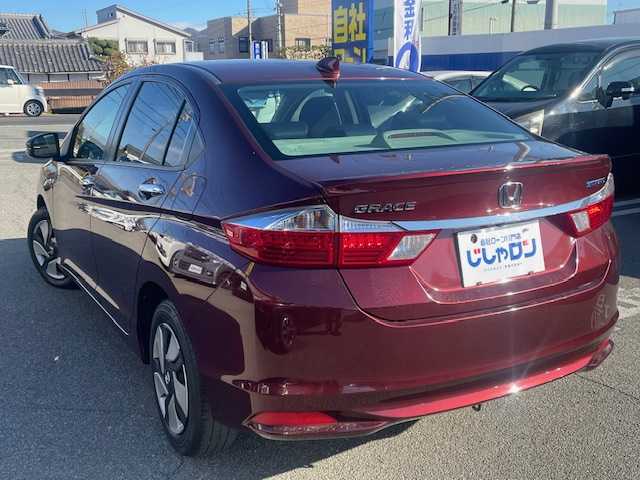 ホンダ グレイス ハイブリッド LX 兵庫県 2015(平27)年 7.3万km プレミアムディープロッソパール 登録時走行距離72436km/純正SDナビ/(AM/FM/DISC/TV/BT)/バックカメラ/クルーズコントロール/ETC/プッシュスタート/スマートキー/スペアキー/パワーウィンドウ/パワーステアリング/保証書/取扱説明書/記録簿/キセノンライト