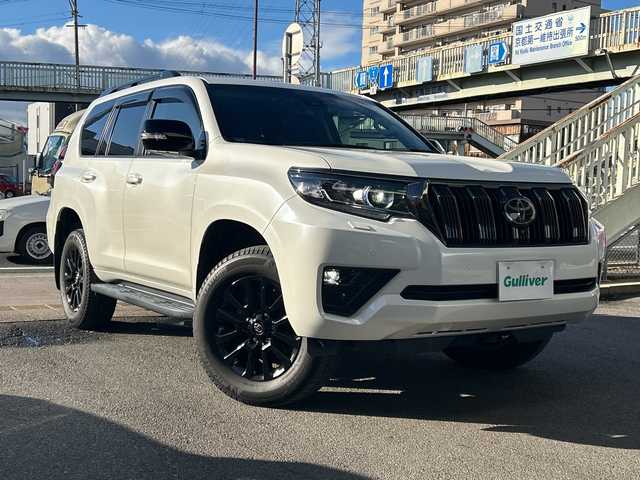 トヨタ ランドクルーザー プラド TX-L 70thアニバーサリーLTD 京都府 2021(令3)年 1.7万km ホワイトパールクリスタルシャイン ワンオーナー/純正メモリナビ/フルセグテレビ/バックカメラ/アラウンドビュー/Bluetooth/ウィンカーミラー/クルーズコントロール/サンルーフ/ドアバイザー/プッシュスタート/ビルトインETC2.0/衝突軽減ブレーキ/レーンキープ/コーナーセンサー