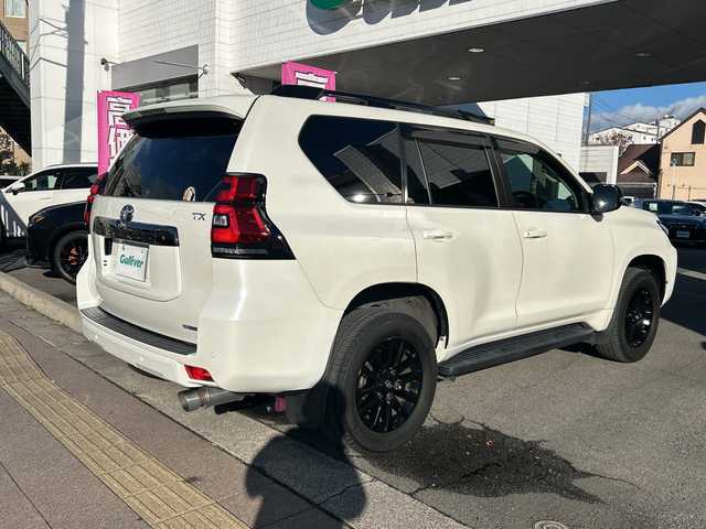 トヨタ ランドクルーザー プラド TX-L 70thアニバーサリーLTD 京都府 2021(令3)年 1.7万km ホワイトパールクリスタルシャイン ワンオーナー/純正メモリナビ/フルセグテレビ/バックカメラ/アラウンドビュー/Bluetooth/ウィンカーミラー/クルーズコントロール/サンルーフ/ドアバイザー/プッシュスタート/ビルトインETC2.0/衝突軽減ブレーキ/レーンキープ/コーナーセンサー