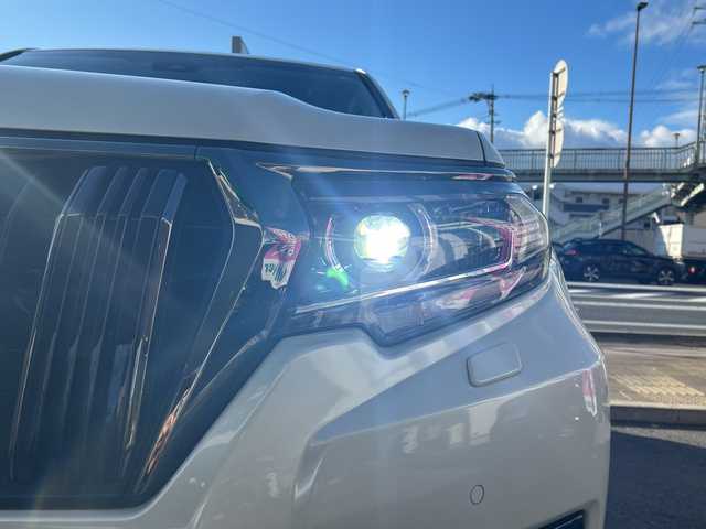 トヨタ ランドクルーザー プラド TX-L 70thアニバーサリーLTD 京都府 2021(令3)年 1.7万km ホワイトパールクリスタルシャイン ワンオーナー/純正メモリナビ/フルセグテレビ/バックカメラ/アラウンドビュー/Bluetooth/ウィンカーミラー/クルーズコントロール/サンルーフ/ドアバイザー/プッシュスタート/ビルトインETC2.0/衝突軽減ブレーキ/レーンキープ/コーナーセンサー