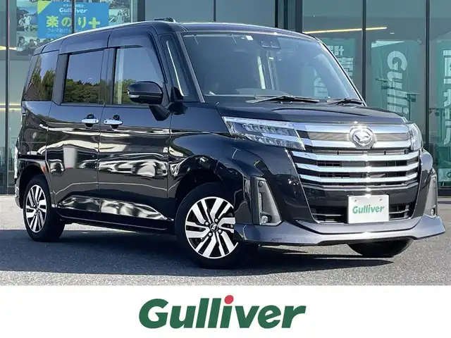 ダイハツ トール カスタムG 島根県 2023(令5)年 2.6万km ブラックマイカメタリック 社外ナビ/CD/DVD/DTV/Bluetooth/全方位カメラ/両側パワースライドドア/レーダークルーズコントロール/ステアリングスイッチ/社外AW付きスタッドレス積込/アイドリングストップ/LEDオートライト/コーナーセンサー /ビルトインETC/電子パーキング/純正フロアマット/純正ドアバイザー/スマートキー/スペアキー