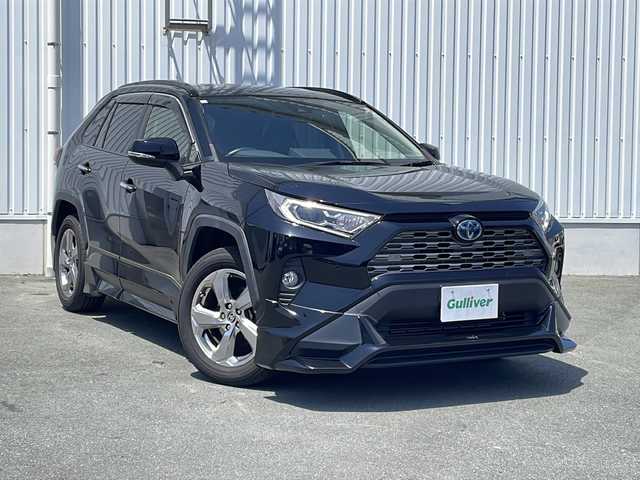 トヨタ ＲＡＶ４ ハイブリットG 三重県 2020(令2)年 9.6万km アティチュードブラックマイカ プッシュスタート/ビルトインETC/パワーバックドア/ステアリングスイッチ/革巻きステアリング/ステアリングヒーター/オートライト/オートマチックハイビーム/リヤクロストラフィックアラート/パーキングサポートブレーキ/ロードサインアシスト/純正フロアマット/純正ホイール/社外エアロ(TRD)/ルーフレール/レーダークルーズコントロール/レーンキープアシスト/前後ドライブレコーダー/パワーシート(D席)/シートヒーター(D+N席)/横滑り防止/純正SDナビ(AM/FM/CD/DVD/TV/BT)/バックカメラ/電子パーキング/黒革レザーシート/USB入力端子4か所/衝突軽減ブレーキ/ブラインドスポットモニター/コーナーセンサー/取扱説明書/ナビ取扱説明書/保証書/ワンオーナー/禁煙車/スペアキー