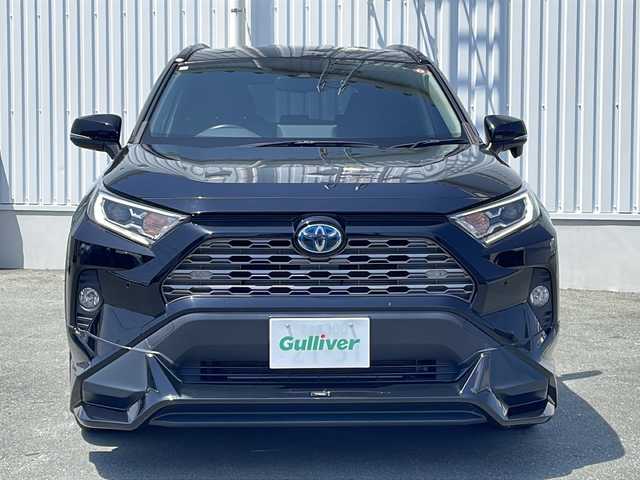 トヨタ ＲＡＶ４ ハイブリットG 三重県 2020(令2)年 9.6万km アティチュードブラックマイカ プッシュスタート/ビルトインETC/パワーバックドア/ステアリングスイッチ/革巻きステアリング/ステアリングヒーター/オートライト/オートマチックハイビーム/リヤクロストラフィックアラート/パーキングサポートブレーキ/ロードサインアシスト/純正フロアマット/純正ホイール/社外エアロ(TRD)/ルーフレール/レーダークルーズコントロール/レーンキープアシスト/前後ドライブレコーダー/パワーシート(D席)/シートヒーター(D+N席)/横滑り防止/純正SDナビ(AM/FM/CD/DVD/TV/BT)/バックカメラ/電子パーキング/黒革レザーシート/USB入力端子4か所/衝突軽減ブレーキ/ブラインドスポットモニター/コーナーセンサー/取扱説明書/ナビ取扱説明書/保証書/ワンオーナー/禁煙車/スペアキー