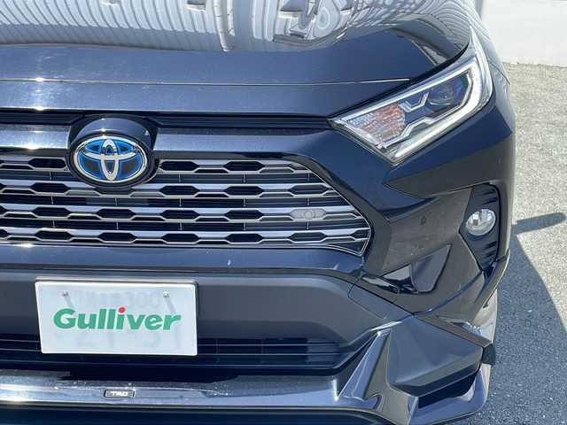 トヨタ ＲＡＶ４ ハイブリットG 三重県 2020(令2)年 9.6万km アティチュードブラックマイカ プッシュスタート/ビルトインETC/パワーバックドア/ステアリングスイッチ/革巻きステアリング/ステアリングヒーター/オートライト/オートマチックハイビーム/リヤクロストラフィックアラート/パーキングサポートブレーキ/ロードサインアシスト/純正フロアマット/純正ホイール/社外エアロ(TRD)/ルーフレール/レーダークルーズコントロール/レーンキープアシスト/前後ドライブレコーダー/パワーシート(D席)/シートヒーター(D+N席)/横滑り防止/純正SDナビ(AM/FM/CD/DVD/TV/BT)/バックカメラ/電子パーキング/黒革レザーシート/USB入力端子4か所/衝突軽減ブレーキ/ブラインドスポットモニター/コーナーセンサー/取扱説明書/ナビ取扱説明書/保証書/ワンオーナー/禁煙車/スペアキー