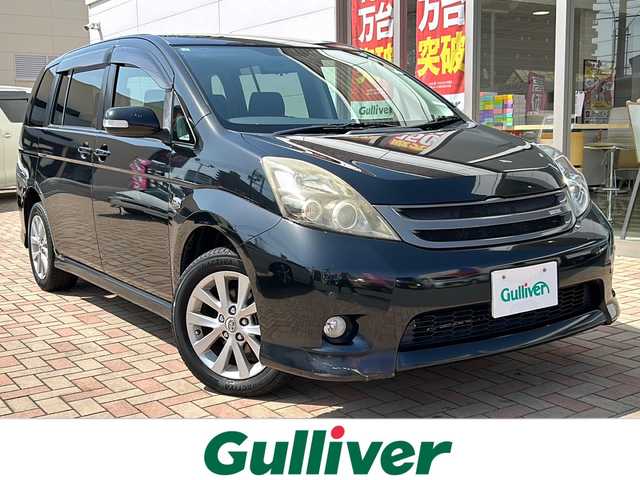 トヨタ アイシス プラタナ Uセレクション 鳥取県 2009(平21)年 19.3万km ブラックマイカ オート4WD/スマートドアロック/両側パワースライド/純正OPグリル/パドルシフト/社外メモリナビゲーション/フルセグ/クリアランスソナー/クリーンエアコン/オートライト/キセノンライト/フォグライト/保証書・取説