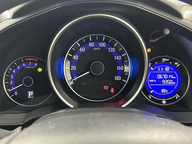 ホンダ フィット 13G Lパッケージ 宮城県 2013(平25)年 6.7万km アラバスターシルバーメタリック 純正オーディオ/LEDヘッドライト/オートライト/プッシュスタート/スマートキー×2/ECON/横滑り防止装置/アイドリングストップ/純正フロアマット/電動格納ミラー/ドアバイザー