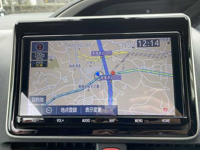 トヨタ ヴォクシー ハイブリッド ZS 煌Ⅱ 沖縄県 2019(令1)年 10.6万km ブラック 純正ナビ/（ＡＭ／ＦＭ／ＣＤ／ＤＶＤ／ＢＴ）　/フルセグＴＶ　/衝突軽減装置　/横滑り防止装置　/盗難防止装置/レーンキープアシスト/前後コーナーセンサー　/両側パワースライドドア　/後席フリップダウンモニター　/ウォークスルー/ドライブレコーダー/スマートキー/プッシュスタート/クルーズコントロール　/バックカメラ/オートヘッドライト/LEDヘッドライト/シートカバー