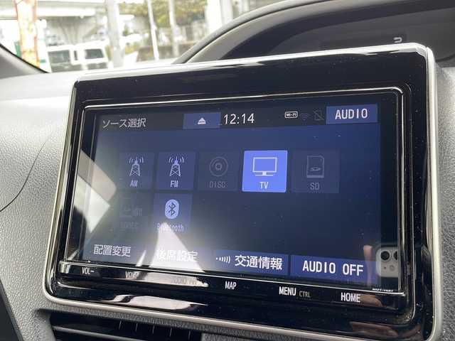 トヨタ ヴォクシー ハイブリッド ZS 煌Ⅱ 沖縄県 2019(令1)年 10.6万km ブラック 純正ナビ/（ＡＭ／ＦＭ／ＣＤ／ＤＶＤ／ＢＴ）　/フルセグＴＶ　/衝突軽減装置　/横滑り防止装置　/盗難防止装置/レーンキープアシスト/前後コーナーセンサー　/両側パワースライドドア　/後席フリップダウンモニター　/ウォークスルー/ドライブレコーダー/スマートキー/プッシュスタート/クルーズコントロール　/バックカメラ/オートヘッドライト/LEDヘッドライト/シートカバー
