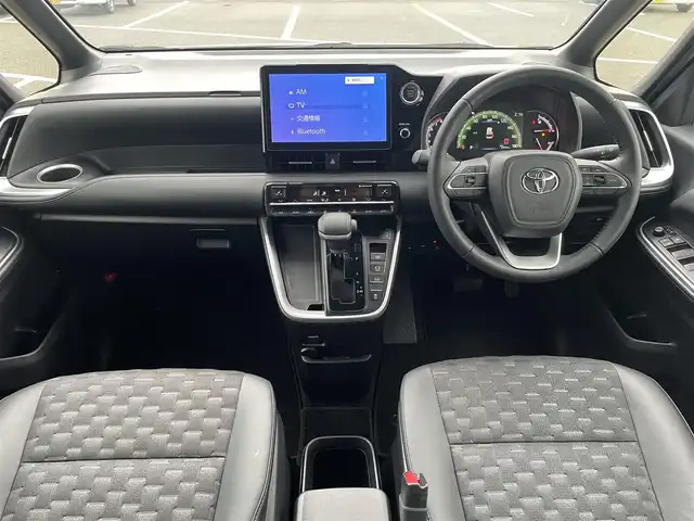 トヨタ ヴォクシー S－Z 鳥取県 2023(令5)年 4.8万km アティチュードブラックマイカ 純正１０．５型ナビ／ＴＶ／ＤＶＤ／ＣＤ／ＢＴ／ＨＤＭＩ　バックカメラ・ビルトインETC/前後ドライブレコーダー/純正フリップダウンモニター/トヨタセーフティセンス/レーダークルーズコントロール/レーンキープアシスト/快適利便パッケージHi/前席・後席シートヒーター/ハーフレザーシート/３眼ＬＥＤライト/オットマンシート/両側パワースライドドア/パワーバックドア/純正17インチアルミホイール/フロアマット・バイザー