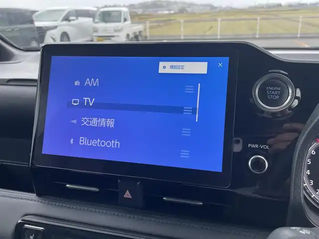 トヨタ ヴォクシー S－Z 鳥取県 2023(令5)年 4.8万km アティチュードブラックマイカ 純正１０．５型ナビ／ＴＶ／ＤＶＤ／ＣＤ／ＢＴ／ＨＤＭＩ　バックカメラ・ビルトインETC/前後ドライブレコーダー/純正フリップダウンモニター/トヨタセーフティセンス/レーダークルーズコントロール/レーンキープアシスト/快適利便パッケージHi/前席・後席シートヒーター/ハーフレザーシート/３眼ＬＥＤライト/オットマンシート/両側パワースライドドア/パワーバックドア/純正17インチアルミホイール/フロアマット・バイザー