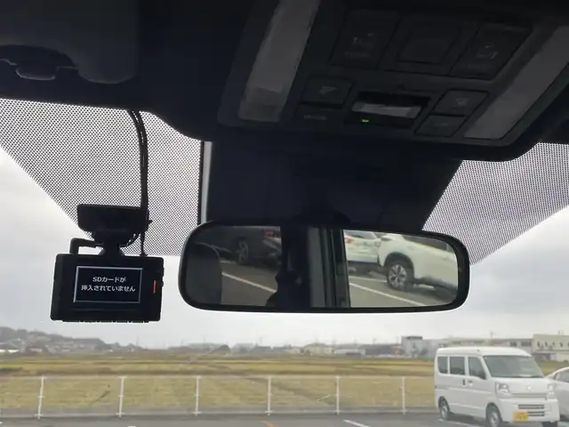 トヨタ ヴォクシー S－Z 鳥取県 2023(令5)年 4.8万km アティチュードブラックマイカ 純正１０．５型ナビ／ＴＶ／ＤＶＤ／ＣＤ／ＢＴ／ＨＤＭＩ　バックカメラ・ビルトインETC/前後ドライブレコーダー/純正フリップダウンモニター/トヨタセーフティセンス/レーダークルーズコントロール/レーンキープアシスト/快適利便パッケージHi/前席・後席シートヒーター/ハーフレザーシート/３眼ＬＥＤライト/オットマンシート/両側パワースライドドア/パワーバックドア/純正17インチアルミホイール/フロアマット・バイザー