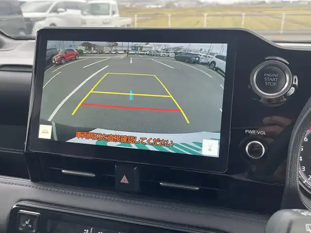 トヨタ ヴォクシー S－Z 鳥取県 2023(令5)年 4.8万km アティチュードブラックマイカ 純正１０．５型ナビ／ＴＶ／ＤＶＤ／ＣＤ／ＢＴ／ＨＤＭＩ　バックカメラ・ビルトインETC/前後ドライブレコーダー/純正フリップダウンモニター/トヨタセーフティセンス/レーダークルーズコントロール/レーンキープアシスト/快適利便パッケージHi/前席・後席シートヒーター/ハーフレザーシート/３眼ＬＥＤライト/オットマンシート/両側パワースライドドア/パワーバックドア/純正17インチアルミホイール/フロアマット・バイザー