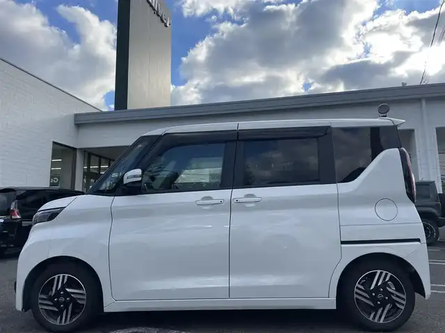 日産 ルークス HWS X プロパイロットED 長崎県 2023(令5)年 2.2万km ホワイトパール ワンオーナー/純正ナビ（フルセグ、AM、FM、BTA）/バックカメラ/アラウンドビューモニター/プッシュスタート/両側パワースライドドア/アイドリングストップ/電動パーキング/オートホールド/追従クルーズコントロール/プロパイロット/車線逸脱警報/車線逸脱防止支援/エマージェンシーブレーキ/先行車発進お知らせ機能/速度標識表示/道路標識表示/前後クリアランスソナー/ふらつき警報/ステアリングリモコン/オートライト/電格ウィンカーミラー/ドアバイザー/フロアマット/スペアキー/リア用サーキュレーター/取扱説明書/ナビ取扱説明書/保証書