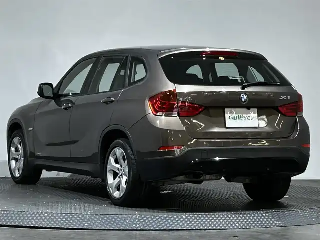 ＢＭＷ Ｘ１ 愛媛県 2010(平22)年 6.7万km ゴールド ・社外ナビ(CN-GP700FVD)/・バックカメラ/・CD＆AM/FM/・純正17インチアルミホイール/・プッシュスタート/・HIDヘッドライト