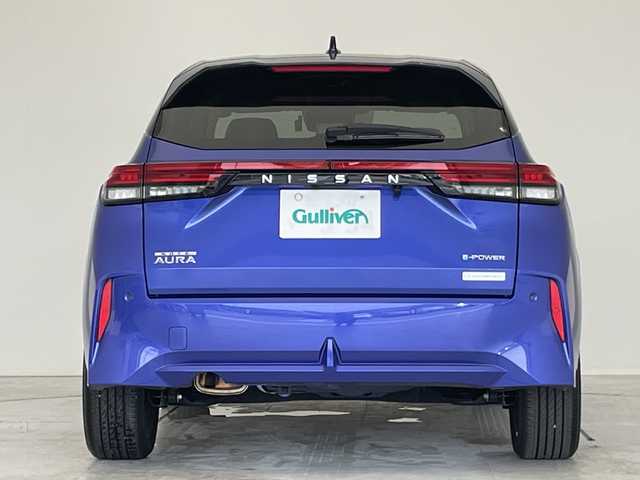 日産 オーラ G レザーエディション 愛知県 2024(令6)年 0.4万km 青 プロパイロット/衝突軽減システム/純正9型ディズプレイオーディオ　ナビ機能あり/プレミアムサウンドBOSE/三眼LEDヘッドライト/全方位カメラ/レーダークルーズコントロール/シートヒーター/フルセグ/Bluetooth/バックカメラ/パワーシート/コーナーセンサー/純正アルミホイール/ETC2.0/ブラインドスポットモニター/ステアリングヒーター/インテリジェントミラー/オートマチックハイビーム/ドライブレコーダー/置くだけ充電機/ステアリングスイッチ/スマートキー/プッシュスタート