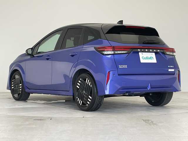 日産 オーラ G レザーエディション 愛知県 2024(令6)年 0.4万km 青 プロパイロット/衝突軽減システム/純正9型ディズプレイオーディオ　ナビ機能あり/プレミアムサウンドBOSE/三眼LEDヘッドライト/全方位カメラ/レーダークルーズコントロール/シートヒーター/フルセグ/Bluetooth/バックカメラ/パワーシート/コーナーセンサー/純正アルミホイール/ETC2.0/ブラインドスポットモニター/ステアリングヒーター/インテリジェントミラー/オートマチックハイビーム/ドライブレコーダー/置くだけ充電機/ステアリングスイッチ/スマートキー/プッシュスタート