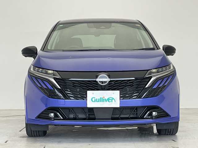 日産 オーラ G レザーエディション 愛知県 2024(令6)年 0.4万km 青 プロパイロット/衝突軽減システム/純正9型ディズプレイオーディオ　ナビ機能あり/プレミアムサウンドBOSE/三眼LEDヘッドライト/全方位カメラ/レーダークルーズコントロール/シートヒーター/フルセグ/Bluetooth/バックカメラ/パワーシート/コーナーセンサー/純正アルミホイール/ETC2.0/ブラインドスポットモニター/ステアリングヒーター/インテリジェントミラー/オートマチックハイビーム/ドライブレコーダー/置くだけ充電機/ステアリングスイッチ/スマートキー/プッシュスタート