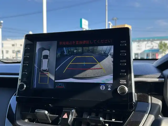 トヨタ カローラ クロス ハイブリッド Z 愛媛県 2023(令5)年 3.9万km ダークブルーマイカM 登録時走行距離：38194Km/純正OPメモリナビ/純正ビルトインETC2.0/追従クルコン/横滑り防止装置/盗難防止装置/衝突軽減システム/レーンキープアシスト/前後コーナーセンサー/LEDヘッドライト/オートライト/オートハイビーム/エンジンスタートボタン/シートヒーター/スマートキー/スペアキー一本/純正アルミホイール/ルーフレール