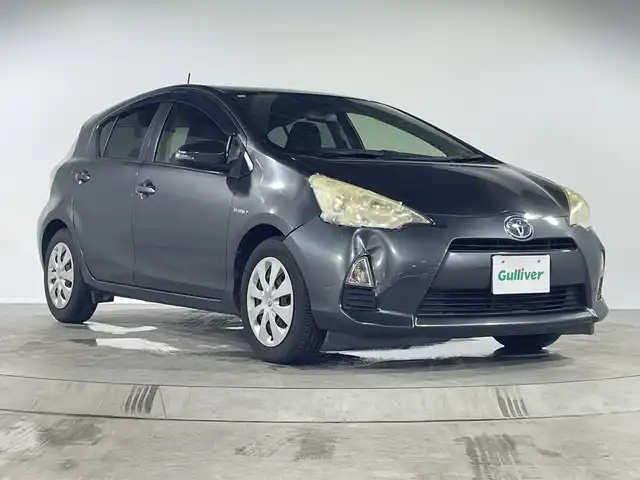 トヨタ アクア S 福岡県 2012(平24)年 7.9万km グレーメタリック 禁煙車社外7型SDナビ（フルセグTV/BT）ETCシートヒーター電格ミラースマートキープッシュスタートオートライトフロアマット