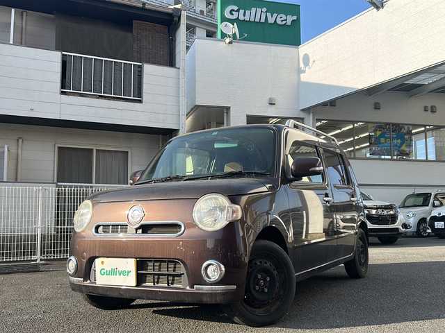 ダイハツ ミラ ココア プラスX 宮崎県 2014(平26)年 10.3万km シャイニングレッド 純正ナビ/CD/DVDチェンジャー/ワンセグTV/ルーフレール/パワーステアリング/パワーウィンドウ