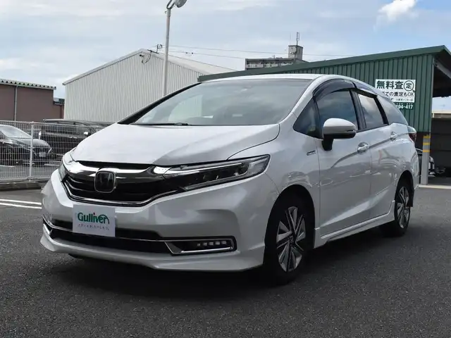 ホンダ シャトル ハイブリッド X ホンダセンシング 福岡県 2021(令3)年 10.9万km プラチナホワイトパール 　シャトル　ハイブリッドX　ホンダセンシング　/社外ナビ/　　AVIC-RZ03/　　B・T/バックカメラ/レーダークルーズコントロール/パドルシフト/前席シートヒーター/LEDヘッドライト/フォグランプ/ETC/取扱説明書あり