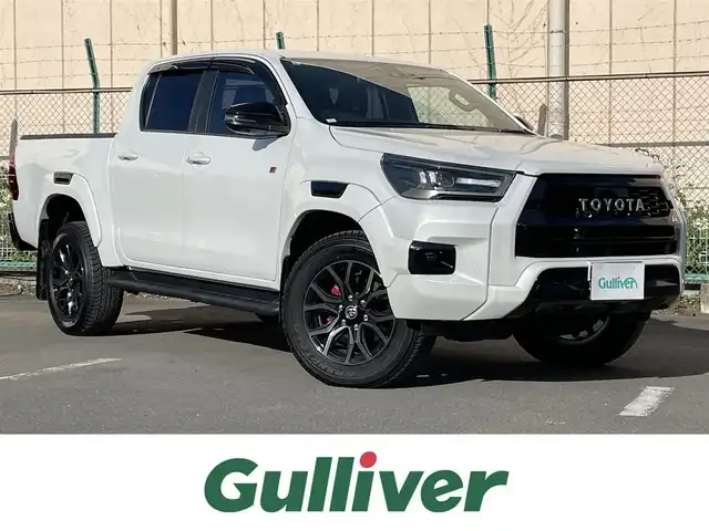トヨタ ハイラックス Z GRスポーツ 東京都 2024(令6)年 1.1万km プラチナホワイトパールマイカ ワンオーナー　/純正８型ディスプレィオーディオナビ /・BluetoothAudio/USB/AM/FM/アラウンドビューモニター /GRドレスUPマフラー /ハーフレザーシート/・D席シートヒーター/GRサイドステップ /バイカラーLEDフォグランプ /プリクラッシュセーフティ /レーダークルーズコントロ-ル/レーンディパーチャーアラート/ロードサインアシスト/クリアランスソナー/バックソナー/アクティブトラクションコントロール/ダウンヒルアシストコントロール/リアデフロック/プッシュエンジンスタート/保証書＆取説